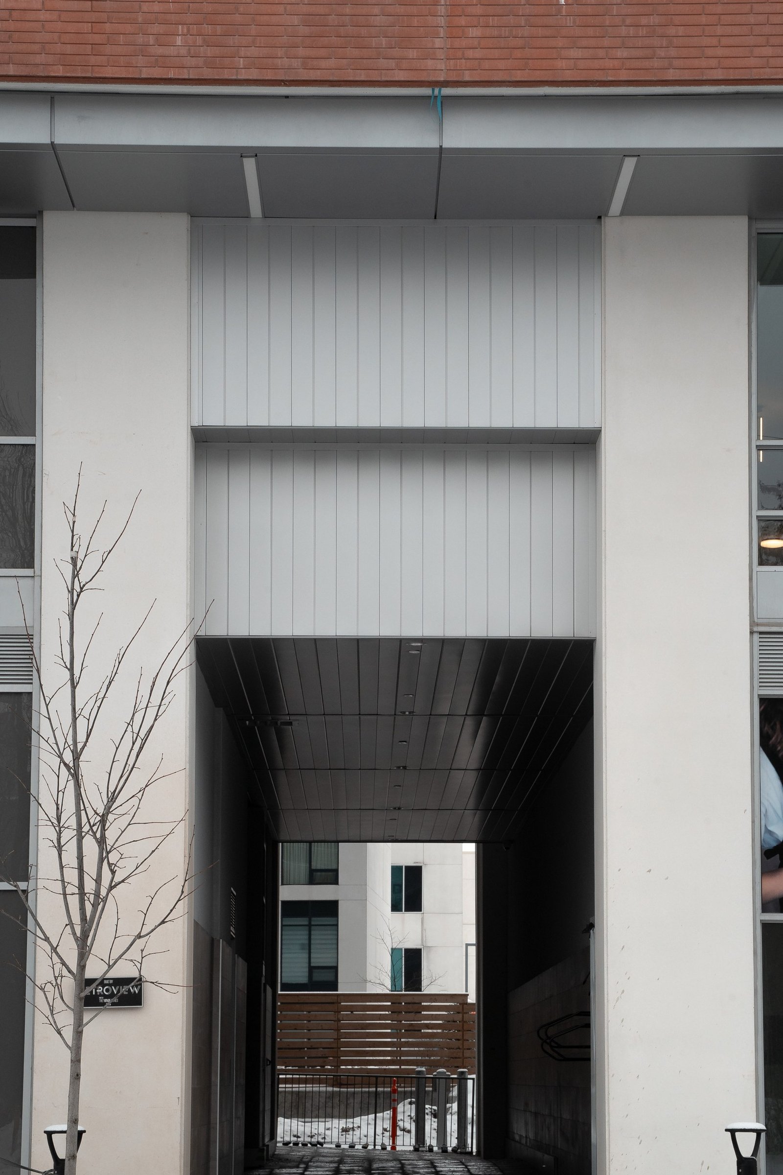 Corrugated metal siding adds a bold contemporary texture with low maintenance.